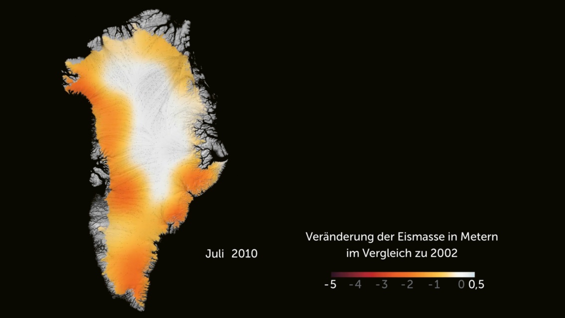 Grönland im Jahr 2010. Die Insel ist mit Orangetönen und hellroten Flecken, besonders an der West- und Südwestküste, gefärbt.