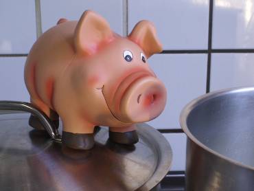 Sparschwein auf Topfdeckel