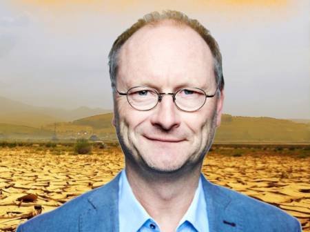 Plakat mit den Veranstaltungsdaten. Das Gesicht von Sven Plöger ist vor eine ausgedörrte Landschaft montiert,