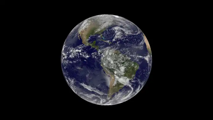 Eine Weltraumaufnahme zeigt den Erdball aus einiger Entfernung, die einzelnen Landmassen sind noch gut erkennbar. 